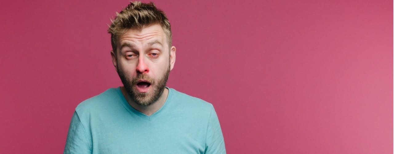 attachment-studio-picture-from-a-young-man-with-handkerchief-going-to-sneeze-picture-id1162109051-min