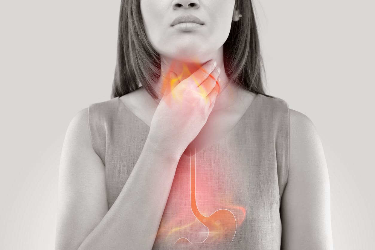 woman-suffering-from-acid-reflux-or-heartburn-isolated-on-white-background